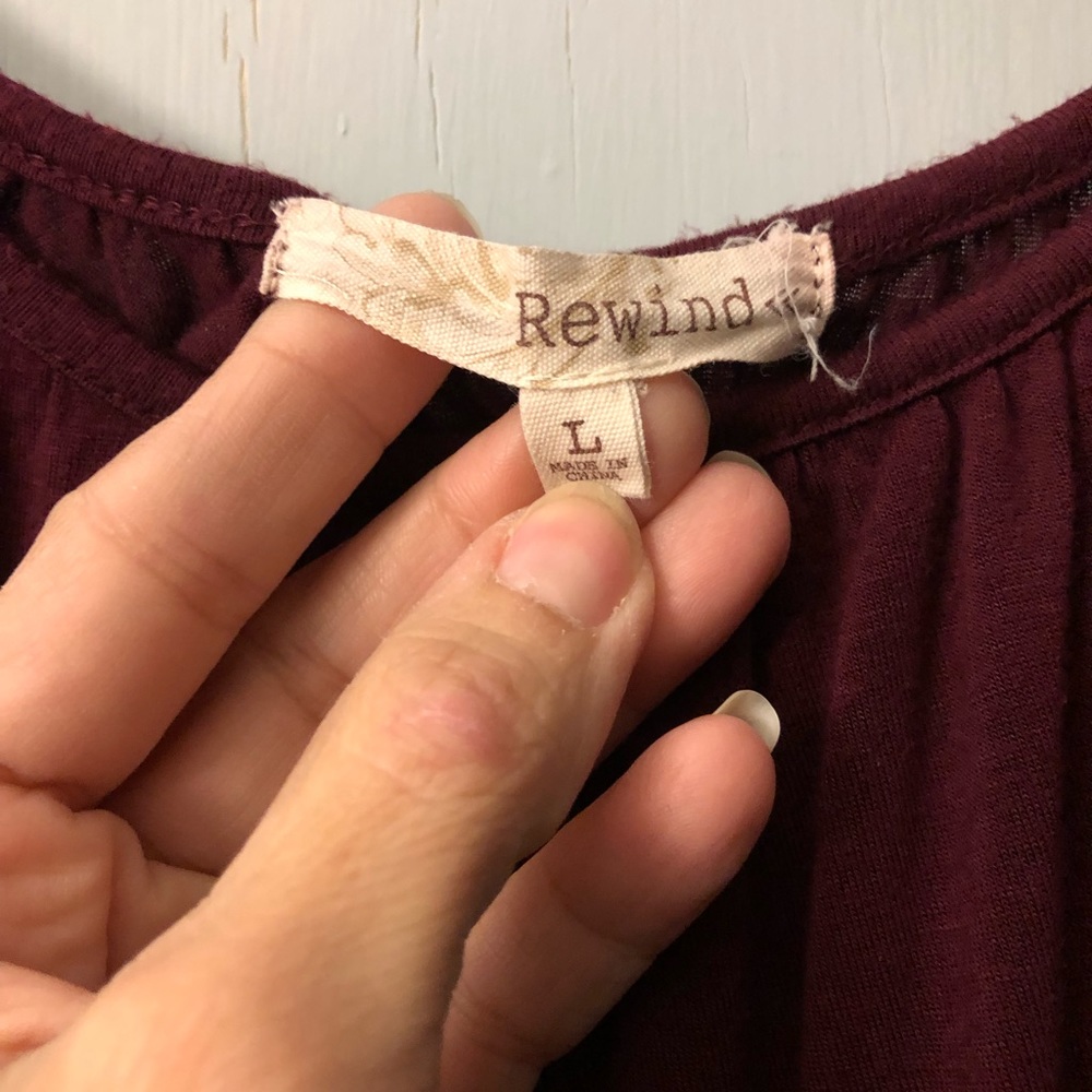 Burgundy cold shoulder shirt.